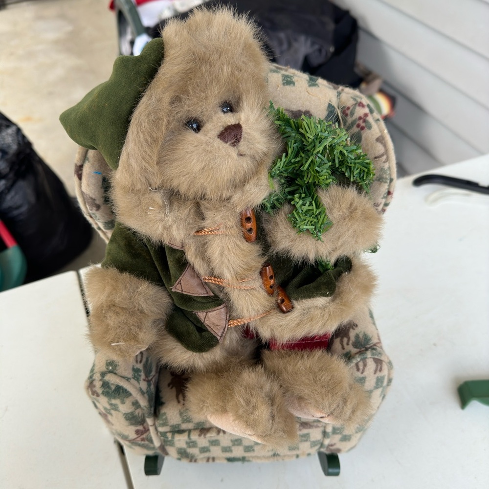 Winter Christmas teddy bear in a rocking chair